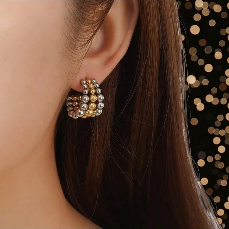 Aretes Tríada Dual Dorado y Plateado